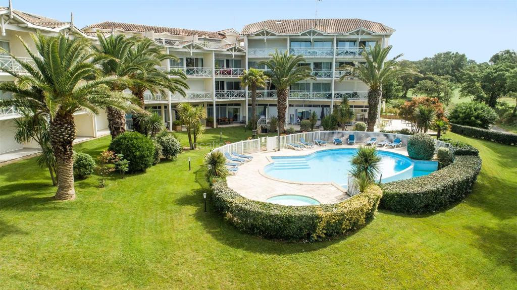 photo de Madame Vacances Les Palmiers du Golf Service Premium