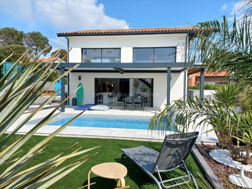 Photo de VILLA Grain De Sable PROCHE PLAGE, GOLF AVEC PISCINE